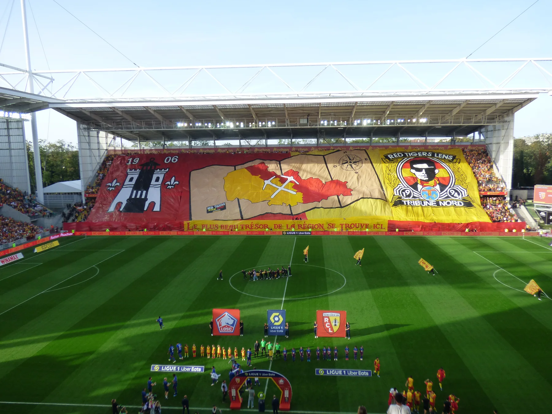 RC Lens supporters display a giant tifo before the Lens versus Lille Ligue 1 match at Stade Bollaert-Delelis in October 2023