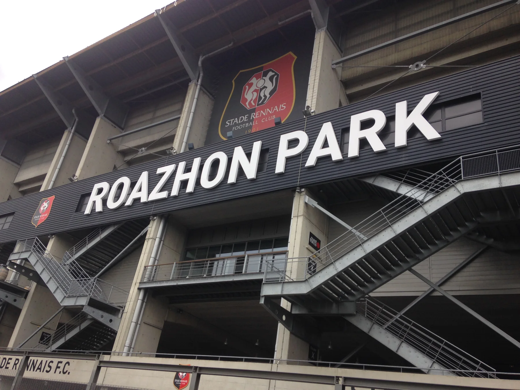 Roazhon Park entrance and Stade Rennais crest in a 2017 stadium photograph